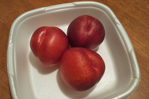 Three red plums