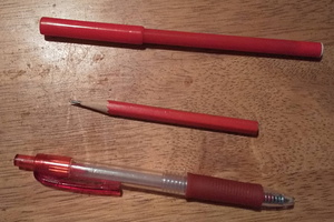 Three red pens